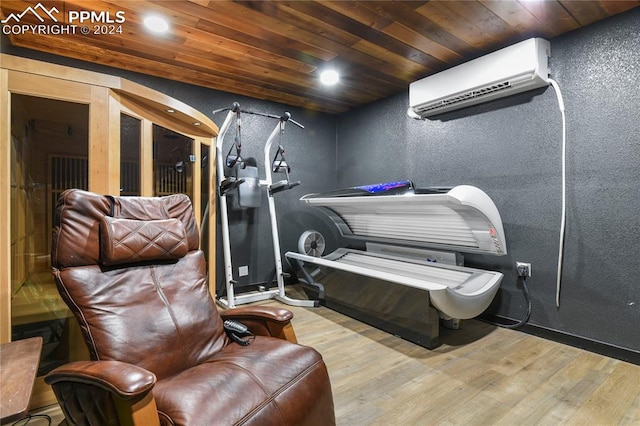 interior space with wood ceiling, hardwood / wood-style flooring, and a wall mounted air conditioner