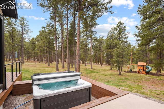 exterior space featuring a hot tub