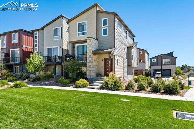 view of front of property with a front lawn