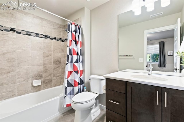 full bathroom with vanity, toilet, shower / tub combo, and tile patterned flooring