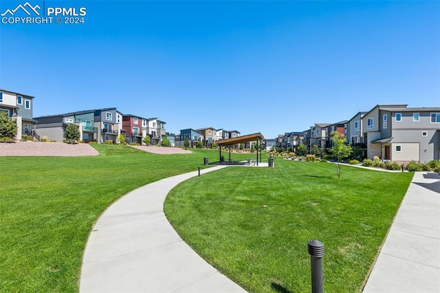 view of community featuring a lawn