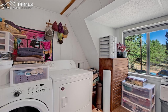 washroom featuring separate washer and dryer and hardwood / wood-style flooring