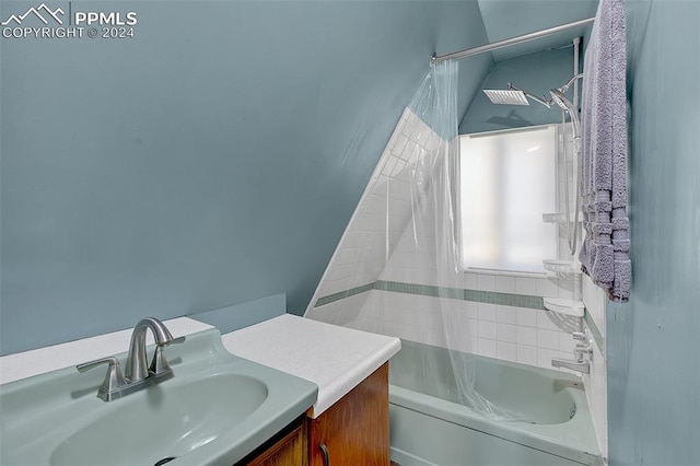 bathroom with vanity and shower / tub combo