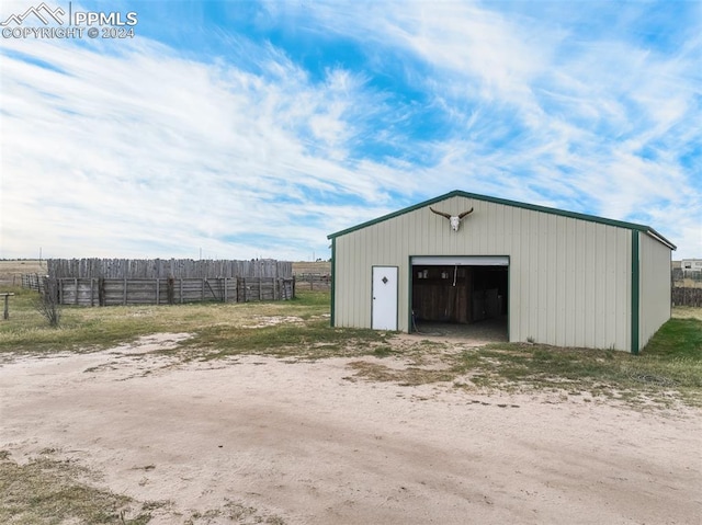 view of outbuilding with a garage