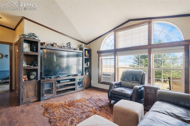 living room with cooling unit, lofted ceiling, a textured ceiling, and hardwood / wood-style floors