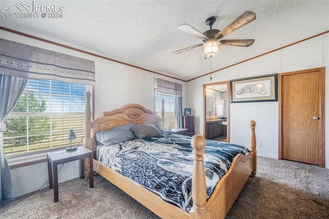 bedroom featuring multiple windows, a textured ceiling, and ceiling fan