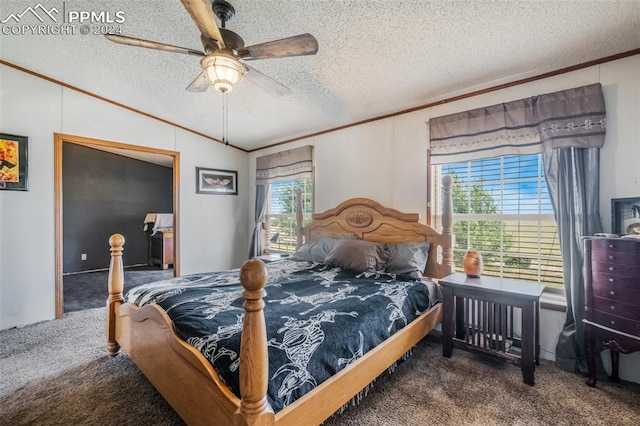 bedroom featuring a textured ceiling, carpet flooring, ornamental molding, and ceiling fan