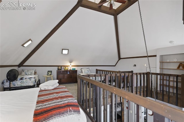 bedroom with high vaulted ceiling and carpet flooring