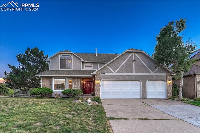 view of front of home with a yard