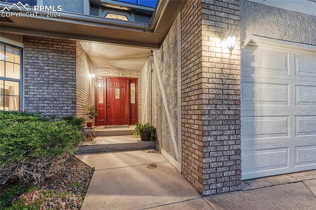 property entrance featuring a garage