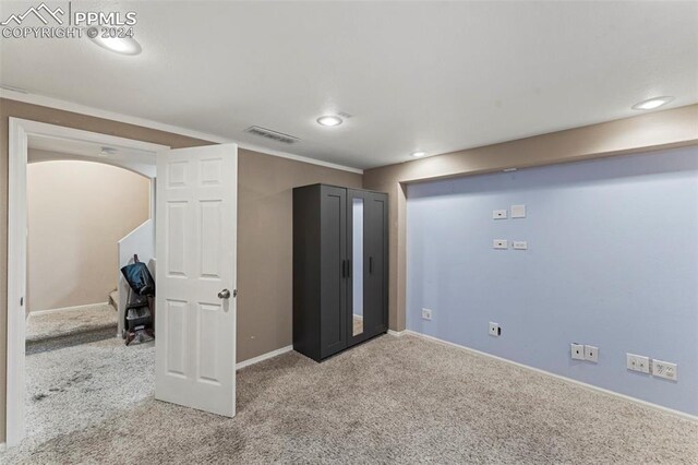 interior space with light colored carpet