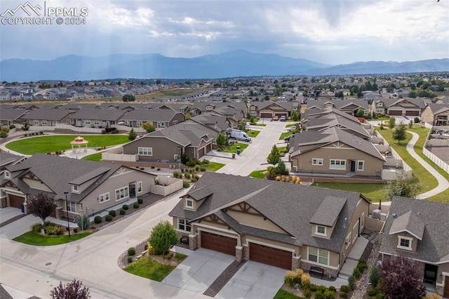 drone / aerial view featuring a mountain view