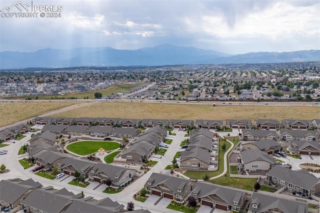 drone / aerial view featuring a mountain view