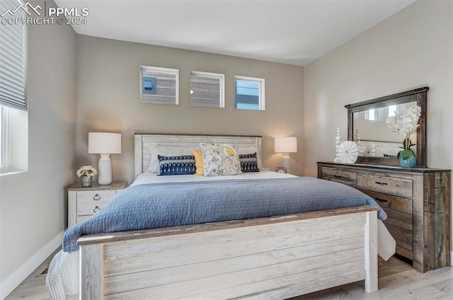 bedroom featuring light wood-type flooring