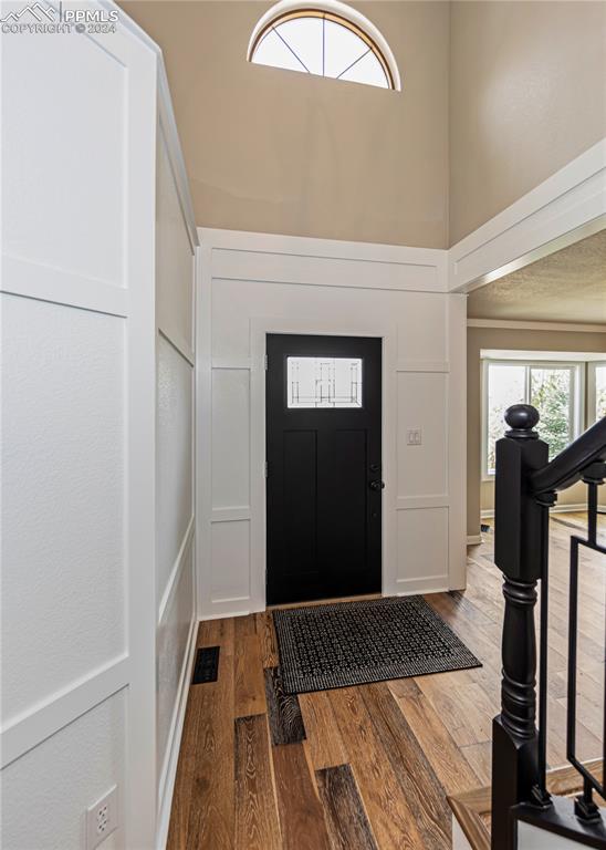 foyer with hardwood / wood-style flooring