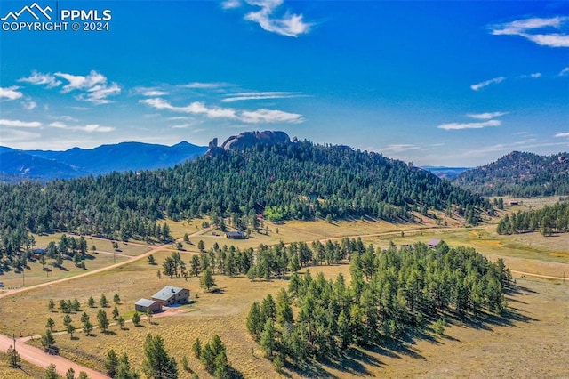 property view of mountains featuring a rural view