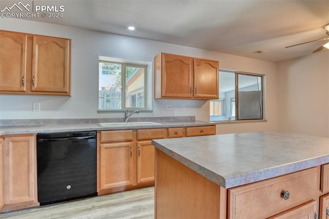 kitchen with dishwasher, a center island, ceiling fan, and sink