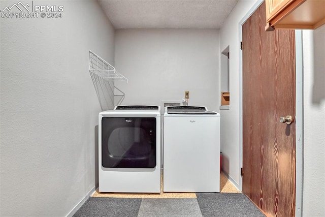 laundry room with separate washer and dryer