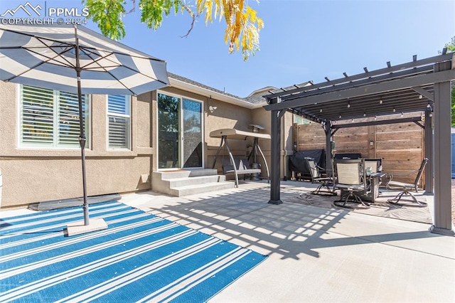 view of patio / terrace featuring a pergola