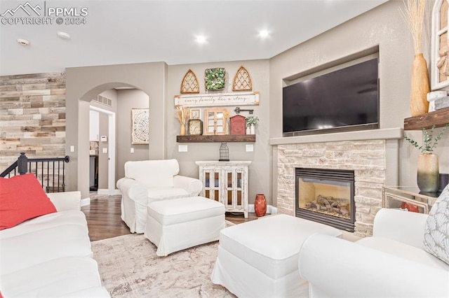 living room featuring hardwood / wood-style floors and a fireplace