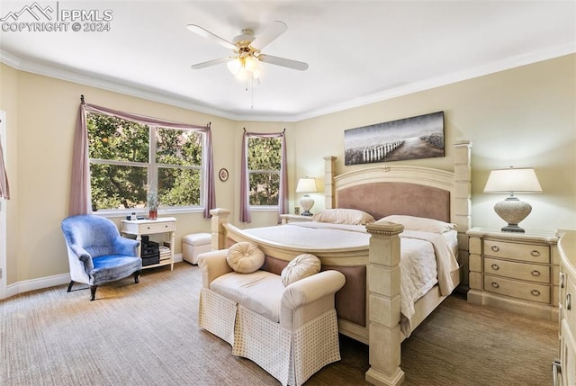 carpeted bedroom featuring crown molding and ceiling fan