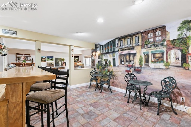 dining room featuring a fireplace