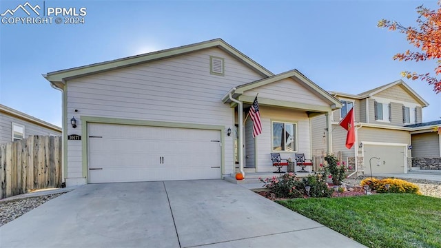 ranch-style home featuring a garage