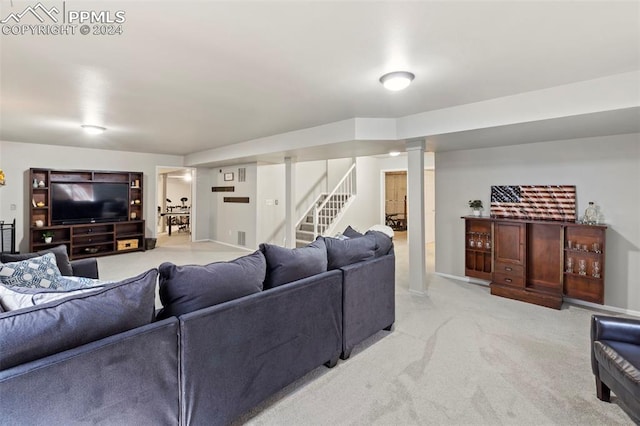 living room featuring light carpet