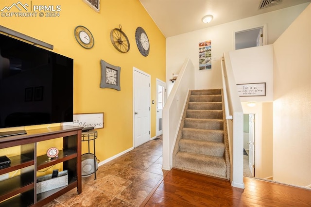 foyer entrance with hardwood / wood-style flooring