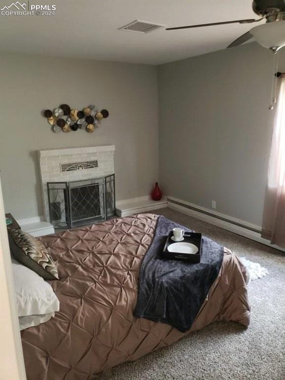 bedroom with ceiling fan and carpet flooring