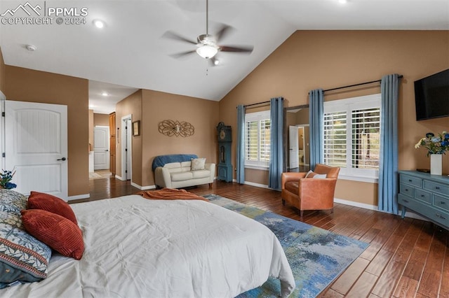 bedroom featuring lofted ceiling, dark hardwood / wood-style flooring, and ceiling fan