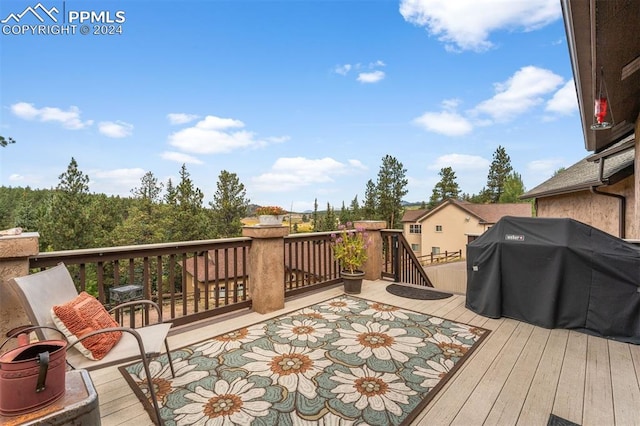 deck featuring grilling area