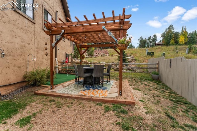 exterior space featuring a pergola and a patio area