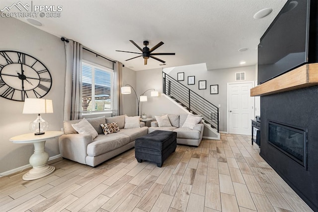 living room with ceiling fan