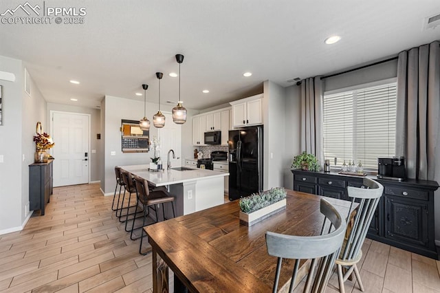 dining space with sink