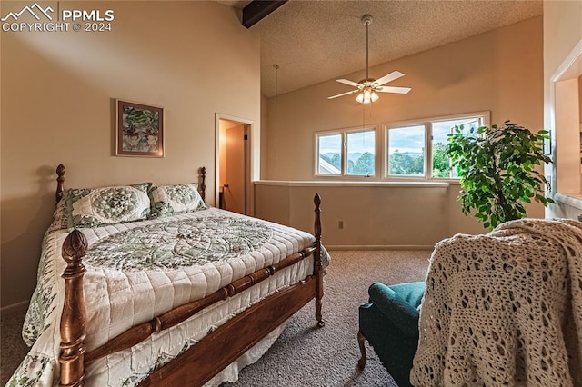 carpeted bedroom with high vaulted ceiling, ceiling fan, and a textured ceiling