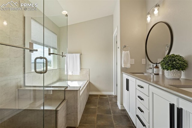 bathroom featuring vaulted ceiling, tile patterned floors, vanity, and shower with separate bathtub