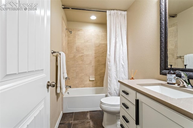 full bathroom with toilet, vanity, tile patterned flooring, and shower / bath combo with shower curtain