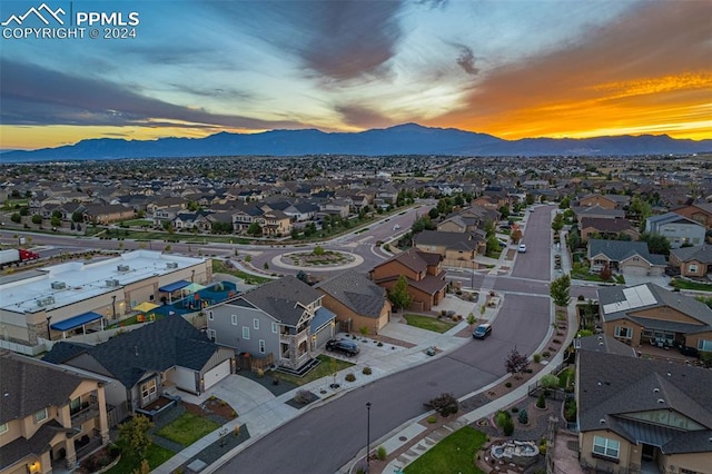 aerial view at dusk with a mountain view