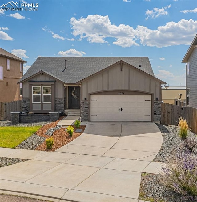 view of front of property featuring a garage