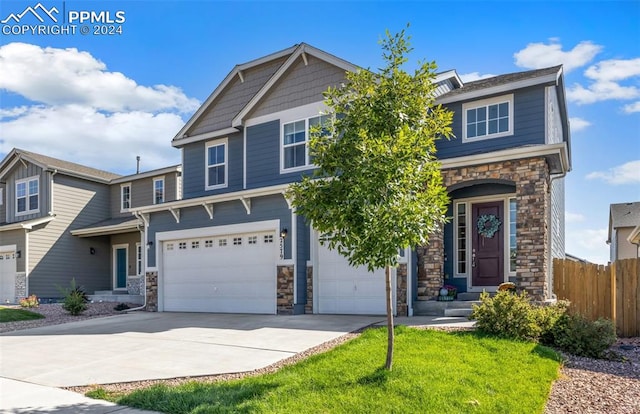 craftsman house featuring a garage