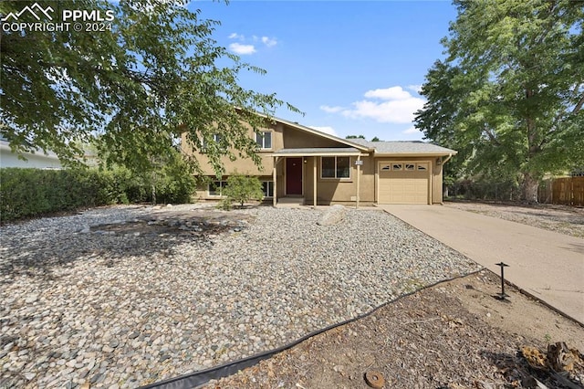 view of front of property featuring a garage