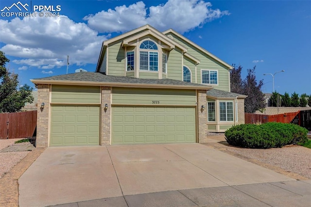 view of front of home with a garage