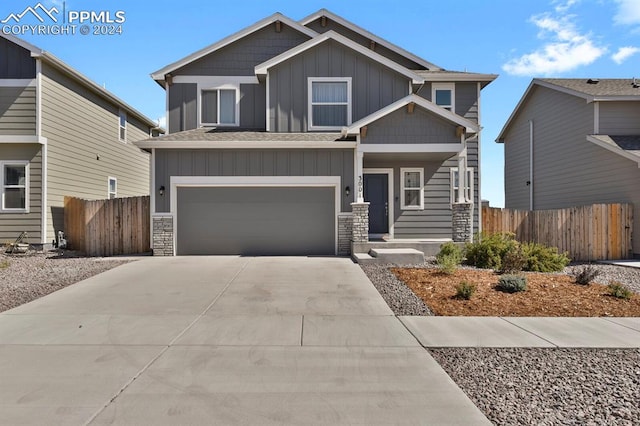 craftsman inspired home featuring a garage