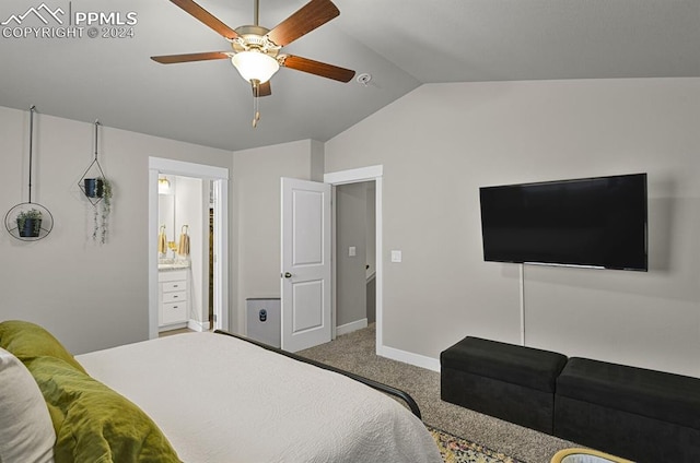 carpeted bedroom featuring connected bathroom, vaulted ceiling, and ceiling fan