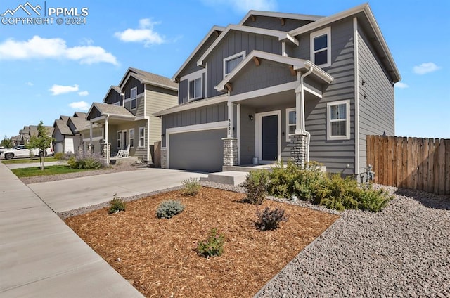 craftsman-style home with a garage