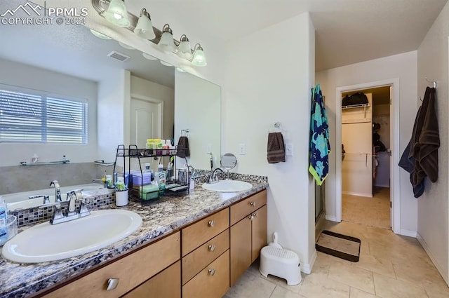 bathroom featuring vanity and tile patterned floors