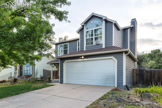 view of front of home with a garage