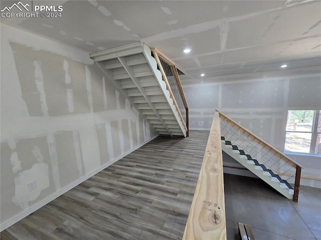 stairway with wood-type flooring