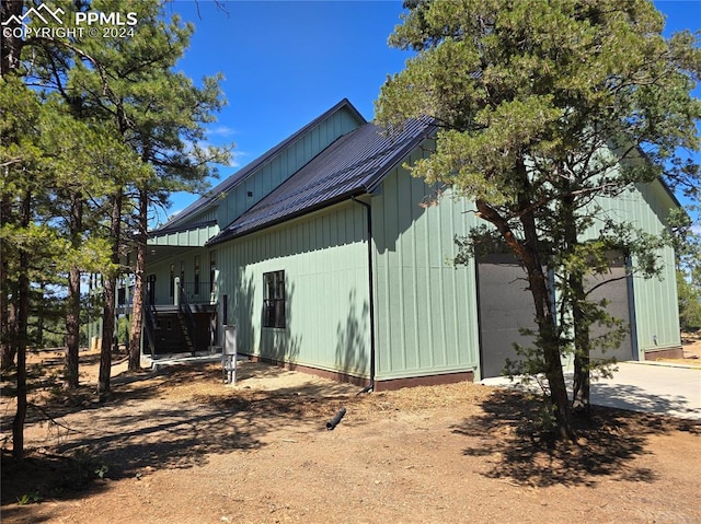 view of home's exterior with a garage